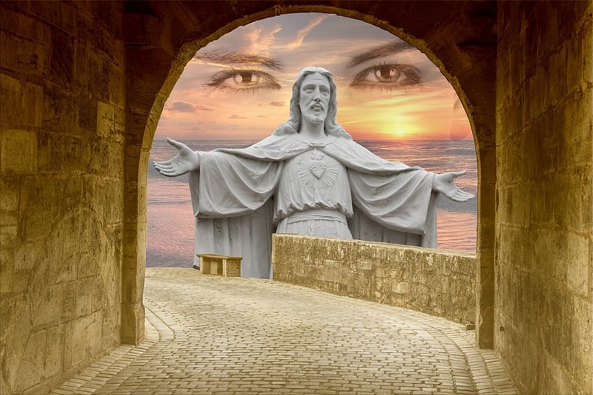 a statue of Jesus Christ with his arms spread open with a pair of eyes behind it.